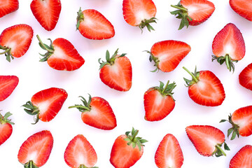 Strawberry half sliced isolated on white background.