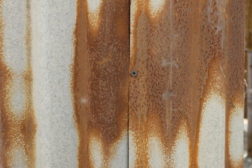 Naklejka premium Zinc on the surface is degraded over time, as well as the life of a person that has to degrade over time as well.