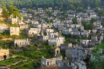 Ruins at the ghost town of Kayakoy in Turkey in summer sunny day
