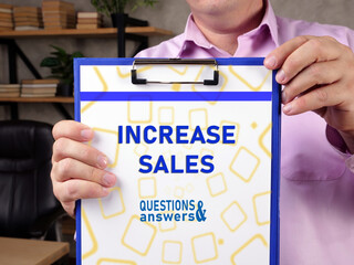 Financial concept meaning INCREASE SALES with sign on the piece of paper.