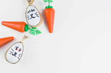 Colorful Easter eggs and other objects on a trendy white backgro