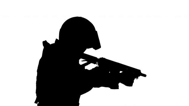 Silhouette Police anti terrorism squad fighter shooting from rifle.