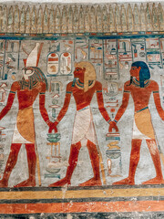 Rock paintings inside the tomb of the pharaoh (Egypt, Luxor)