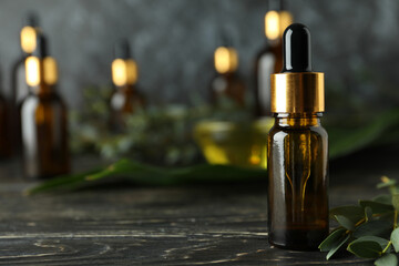 Concept of natural cosmetics with eucalyptus oil on wooden table