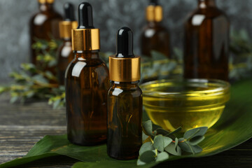 Concept of natural cosmetics with eucalyptus oil on wooden table