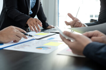 Meeting business team leaders about charts, financial graphs showing results are analyzing and calculating planning strategies, business success building processes