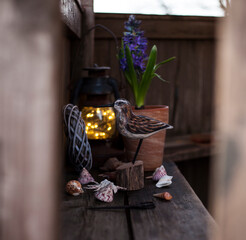 spring composition with hyacinth,lantern and wooden bird sandpiper 