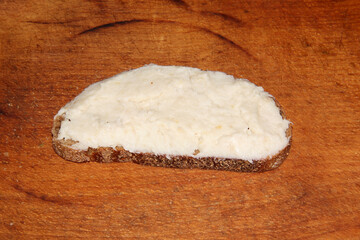 sandwich on a wooden table