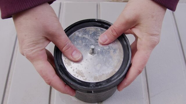 Seal and lid put on rock tumbling barrel and rolled before putting on spinning tumbler for another week for part of the lapidary process.