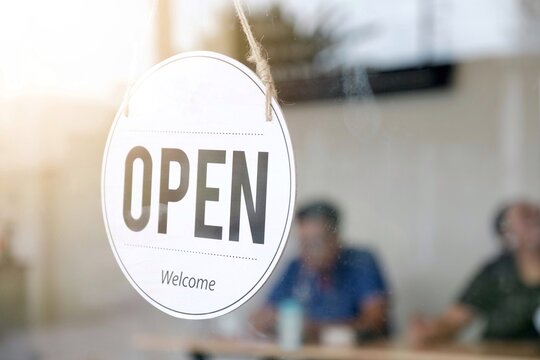 Coffee Shop Opening Sign In The Morning