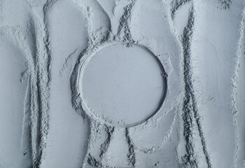 Gray bentonite cosmetic clay powder (facial mask, body wrap, eye shadow) texture close up,...