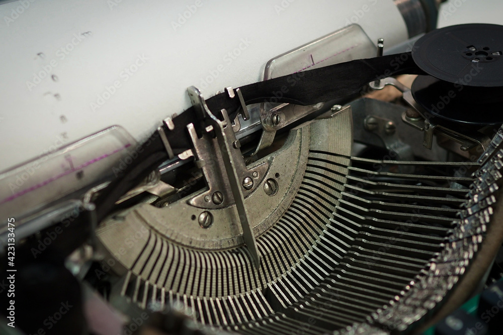 Fototapete isolated vintage typewriter keyboard. slow dolly across type writer keys. macro shot of retro typewr