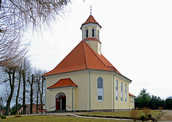 Fototapeta premium built in 1891 as a Lutheran and currently the Catholic church of Saint Stanislaus Kostka in the village of pozezdrze in warmia and masuria in Poland