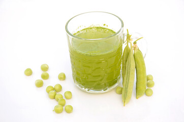 fresh healthy peas juice with peas and beans isolated on white background.