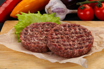 Raw burger cutlet