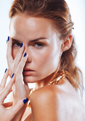 Obraz premium Close up beauty portrait of young woman with beautiful bright makeup. Modern smokey eyes with yellow eyeshadows.