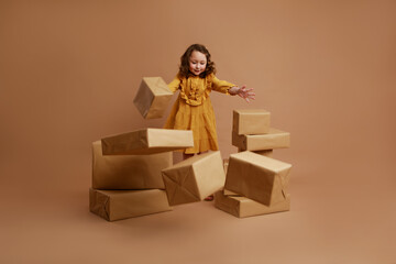 Girl breaking stacks of gifts