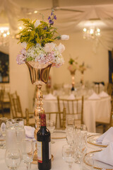 Wedding table decoration with flowers and snacks