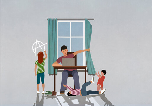 Children distracting father working from home
