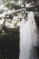 Wedding dress hanging, marriage concept