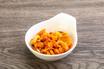 Marinated pickled honey mushrooms in the bowl