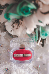 Bridal bouquet with rings, earrings, accessories and shoes, wedding concept