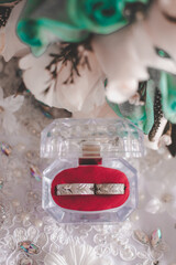 Bridal bouquet with rings, earrings, accessories and shoes, wedding concept