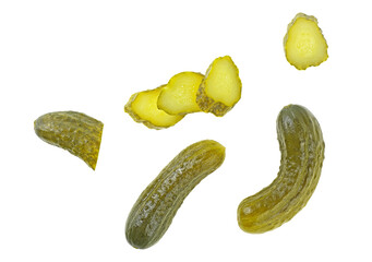 Set of delicious marinated pickled cucumbers isolated on a white background, top view.