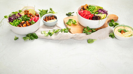 Tasty colorful vegan poke bowl on light gray background.