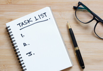 task list or to do list , hand written on notebook 