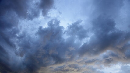 Heavy stormy dark blue rain cloud on a summer evening, beautiful natural landscape