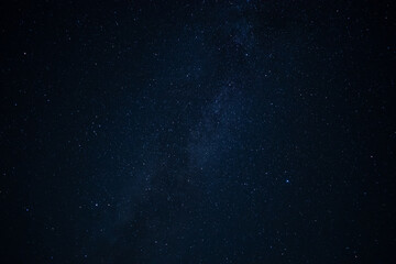 The night sky is covered with stars. Beautiful space background.