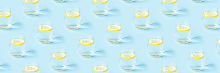 Summer pattern with glasses of lemonade on blue background.