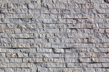 Background, texture, laying natural stone gray tint.