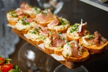 Catering service. Snacks for guests on the table.