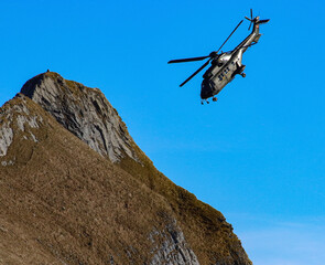 Fototapeta premium helicopter in the mountains
