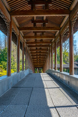 Inside view of a corridor in traditional Chinese architecture.