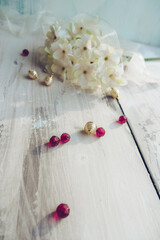 Obraz na płótnie Canvas beads hydrangea and light ribbon