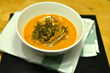Thepo Pork Curry, Thai food traditional Chicken Spicy Curry on the White green cloth background.