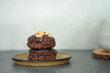 Chocolate scone dessert on top with nut
