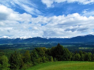 Fototapeta na wymiar View of Gorenjska region of Slovenia with the top of Karavanke mountains covered in snow