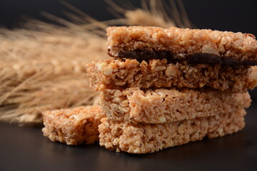 Various healthy granola bars (muesli or cereal bars). Set of energy, sport, breakfast and protein bars. Puffed rice, berries, chocolate, oatmeal, almond and honey cereal bars.