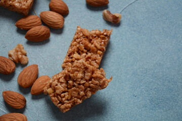 Various healthy granola bars (muesli or cereal bars). Set of energy, sport, breakfast and protein bars. Puffed rice, berries, chocolate, oatmeal, almond and honey cereal bars.