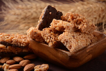 Various healthy granola bars (muesli or cereal bars). Set of energy, sport, breakfast and protein bars. Puffed rice, berries, chocolate, oatmeal, almond and honey cereal bars.