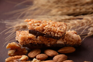 Various healthy granola bars (muesli or cereal bars). Set of energy, sport, breakfast and protein bars. Puffed rice, berries, chocolate, oatmeal, almond and honey cereal bars.