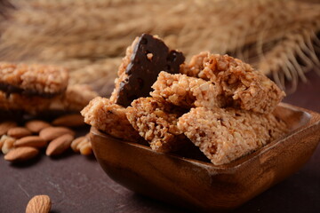 Various healthy granola bars (muesli or cereal bars). Set of energy, sport, breakfast and protein bars. Puffed rice, berries, chocolate, oatmeal, almond and honey cereal bars.