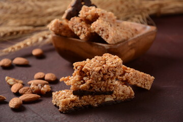 Various healthy granola bars (muesli or cereal bars). Set of energy, sport, breakfast and protein bars. Puffed rice, berries, chocolate, oatmeal, almond and honey cereal bars.