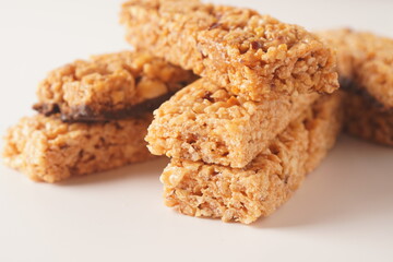 Various healthy granola bars (muesli or cereal bars). Set of energy, sport, breakfast and protein bars. Puffed rice, berries, chocolate, oatmeal, almond and honey cereal bars.