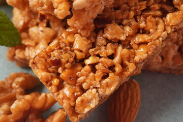 Various healthy granola bars (muesli or cereal bars). Set of energy, sport, breakfast and protein bars. Puffed rice, berries, chocolate, oatmeal, almond and honey cereal bars.