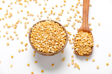 Dried chickpeas in bowl isolated on white background.